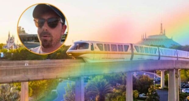 A monorail is traveling on an elevated track with a scenic backdrop of trees and landmarks at sunset. A circular inset in the top left corner shows a close-up of a man wearing sunglasses and a cap, enjoying Disney World. A rainbow-colored filter overlays parts of the image of Disney World, evoking Pride Celebrations.