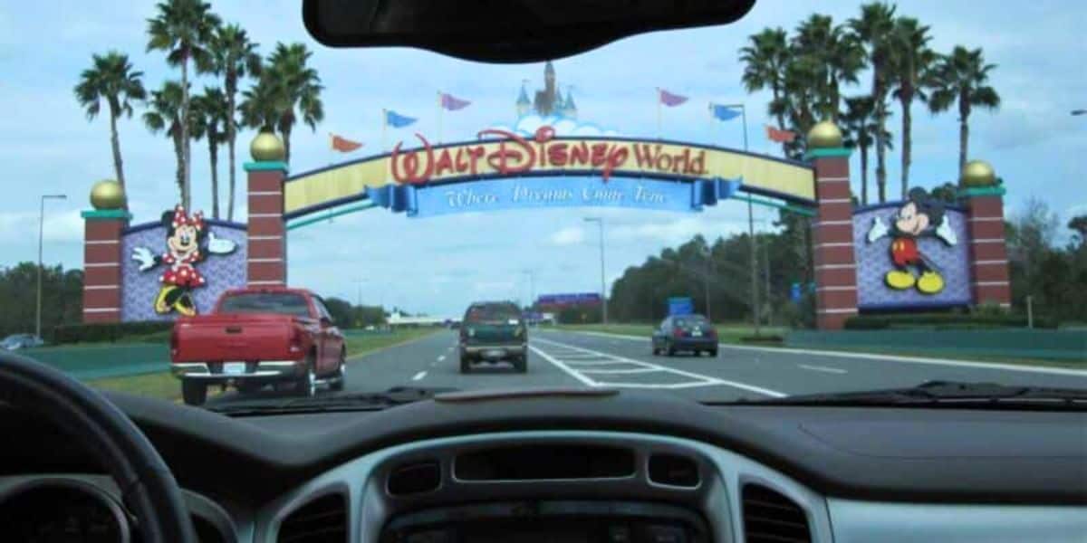 The entrance to Walt Disney World Resort in Central Florida as seen through a car window