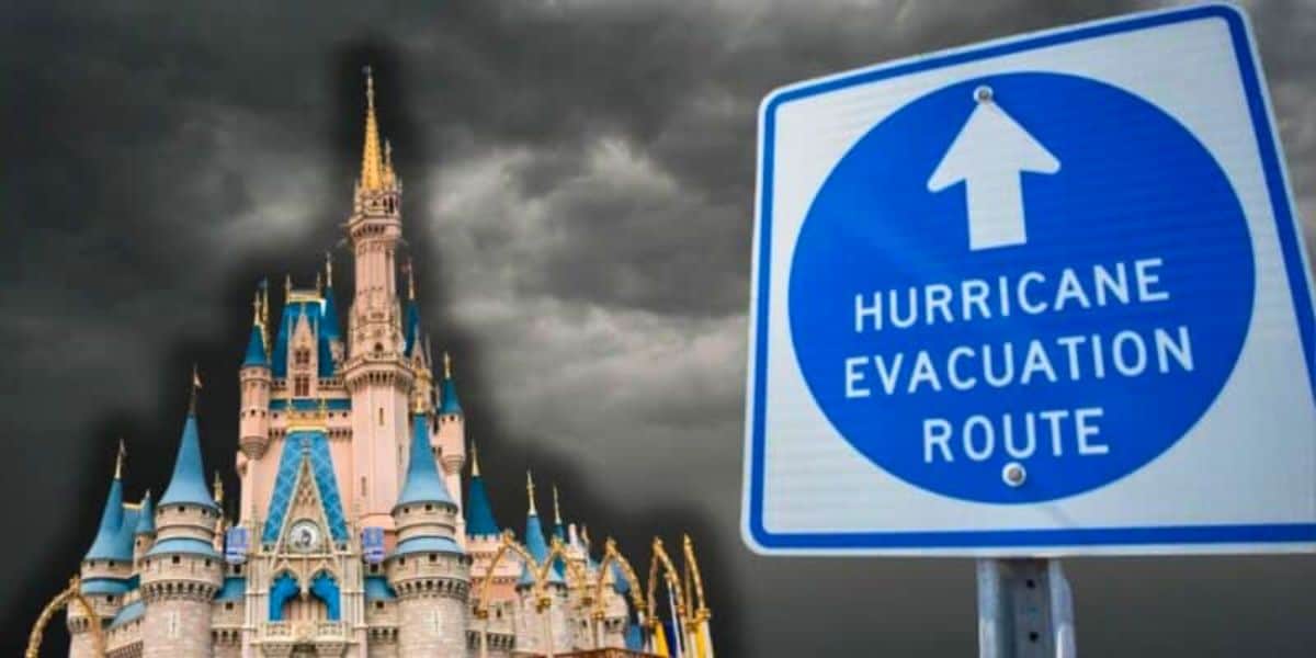 A hurricane evacuation sign with the Magic Kingdom castle and stormy weather in the background