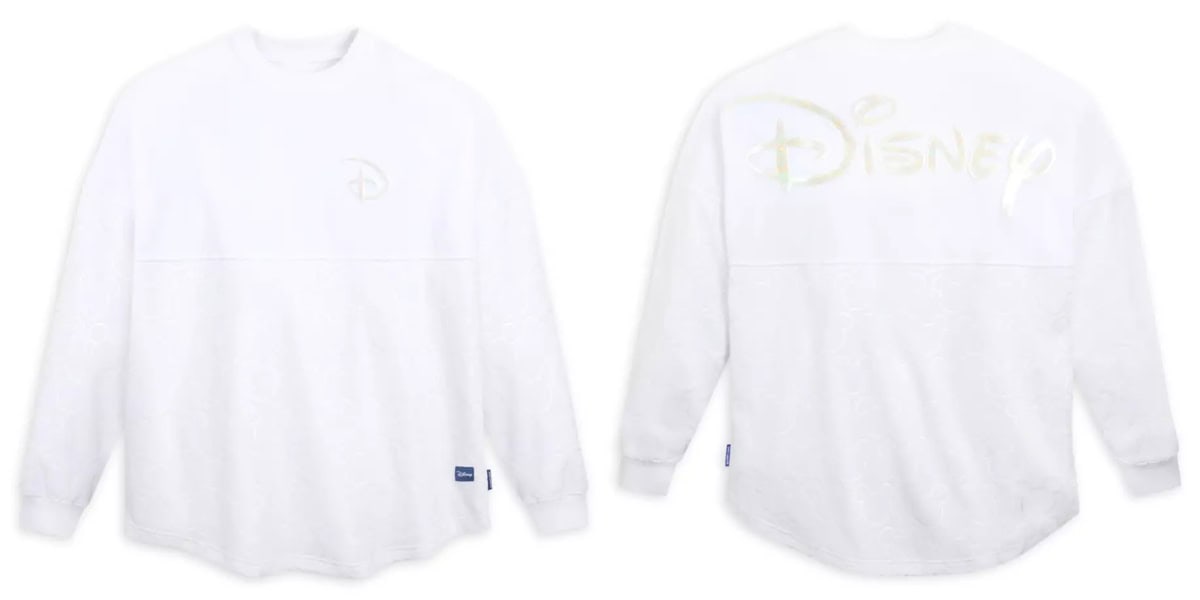 Front and back view of a white long-sleeve shirt featuring a subtle Disney logo. The shirt has a round neckline and visible seams, with the Disney name prominently displayed on the back in a larger font.