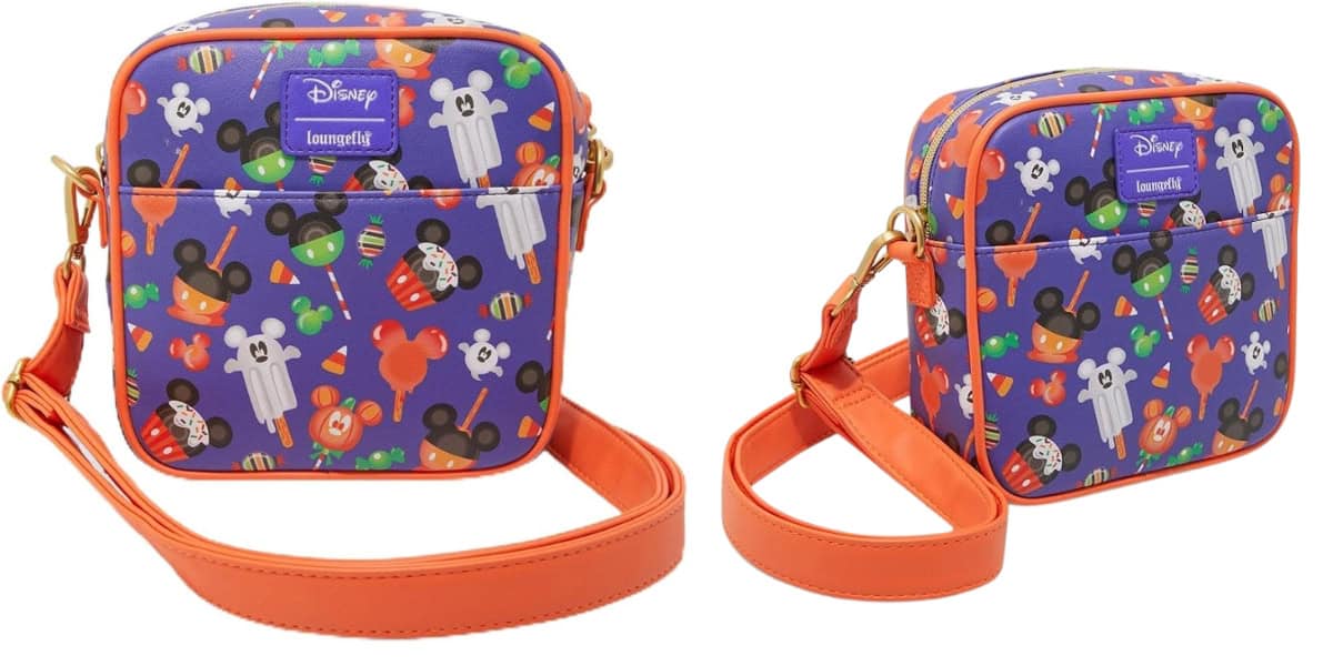 A crossbody bag with an orange strap features a Disney Halloween design. The bag has a purple background adorned with Mickey Mouse pumpkins, ghosts, and candy corn, showcasing a festive Halloween theme.