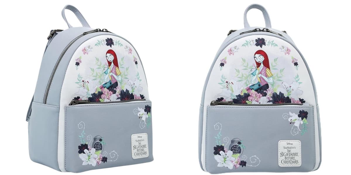 A gray and white backpack featuring a character with long red hair sitting among flowers. The design includes colorful floral patterns and a logo that reads "The Nightmare Before Christmas.