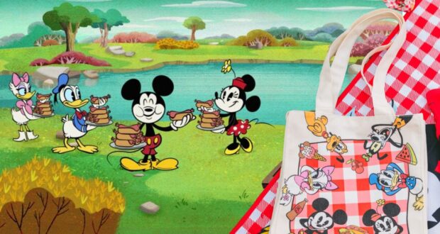 Animated scene featuring Daisy Duck, Donald Duck, Mickey Mouse, and Minnie Mouse having a picnic by a lake, each holding sandwiches. Next to the picnic scene is a bag decorated with images of Mickey and Minnie in various poses with a red checkered pattern.