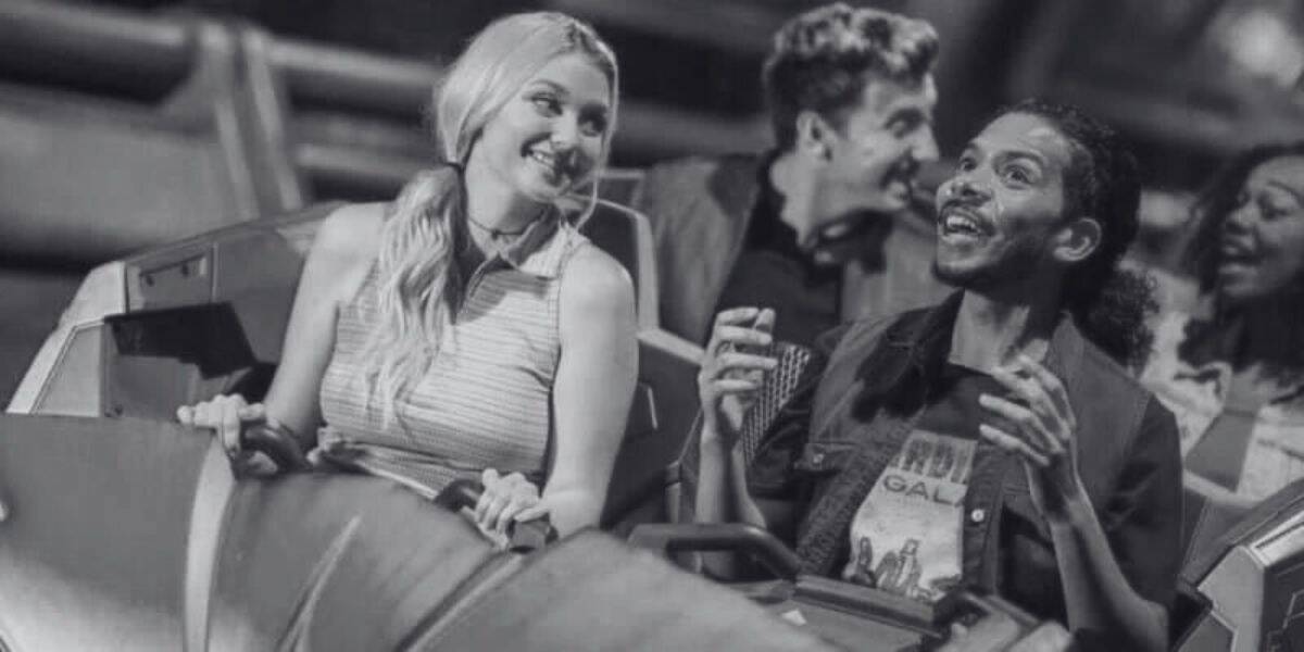 A black and white image of four people on Guardians of the Galaxy: Cosmic Rewind.