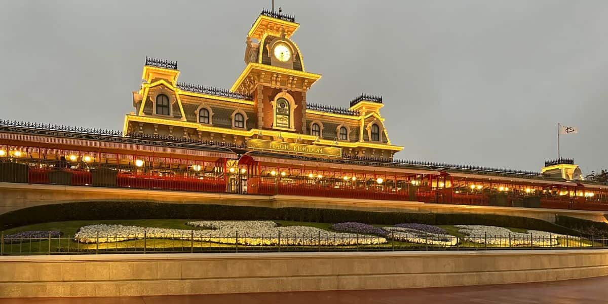 The train station at the entrance to Magic Kingdom Park in the rain.