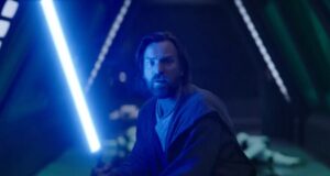 Obi-Wan Kenobi raises his lightsaber