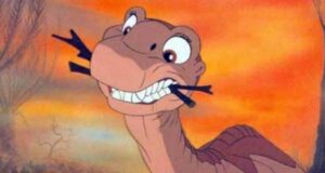Littlefoot with sticks in his mouth in 'The Land Before Time'