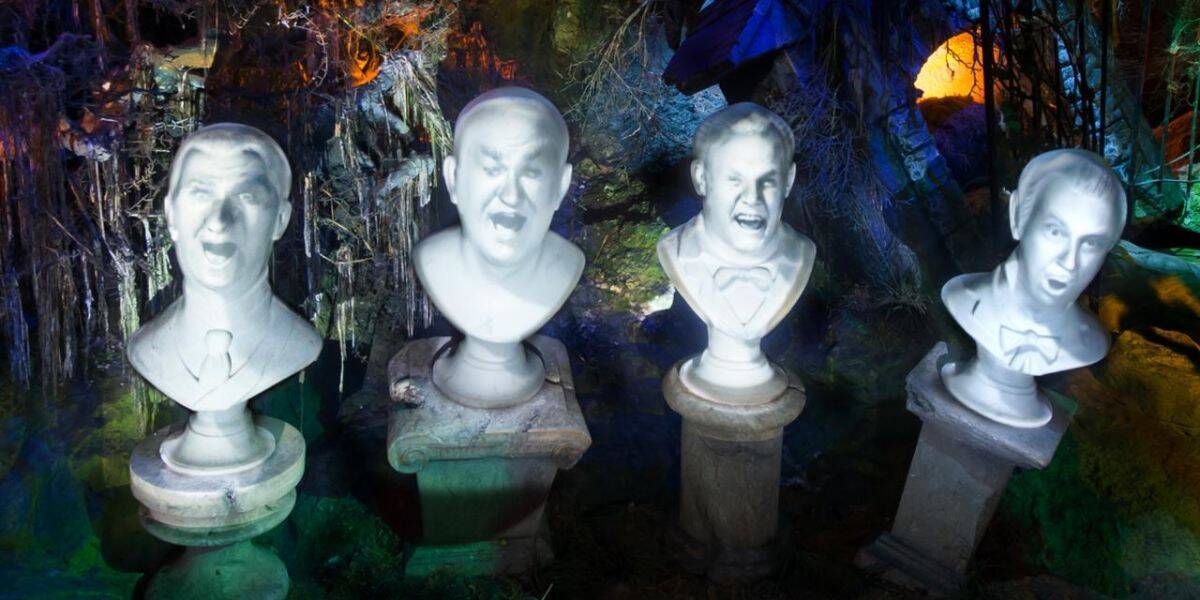 Four white marble busts in Phantom Manor at Disneyland Paris