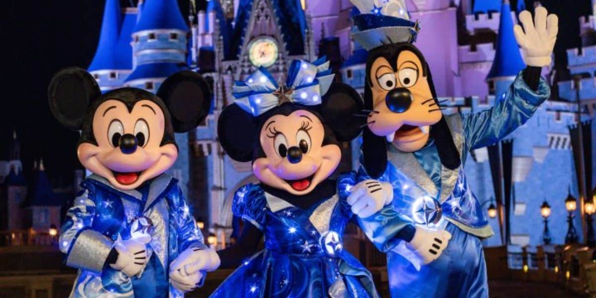  Mickey, Minnie, and Goofy in their Disney Starlight parade outfits 