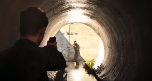 James Bond aiming at an enemy in a tunnel in "007 First Light"