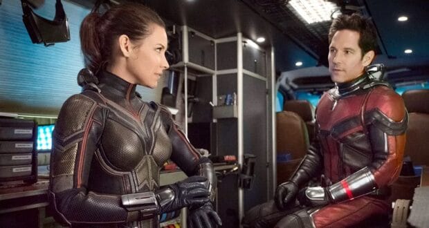 Hope van Dyne/Wasp and Scott Lang/Ant-Man look at each other