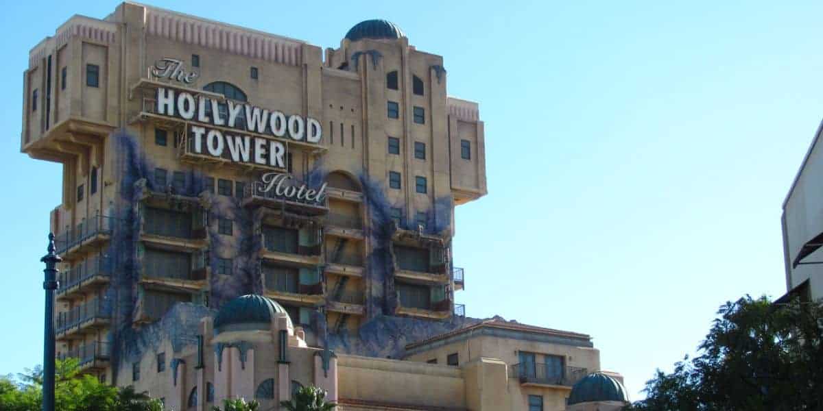 Disney’s Hollywood Tower Hotel stands tall in art deco style, its haunting facade a thrilling icon of the Tower of Terror ride.