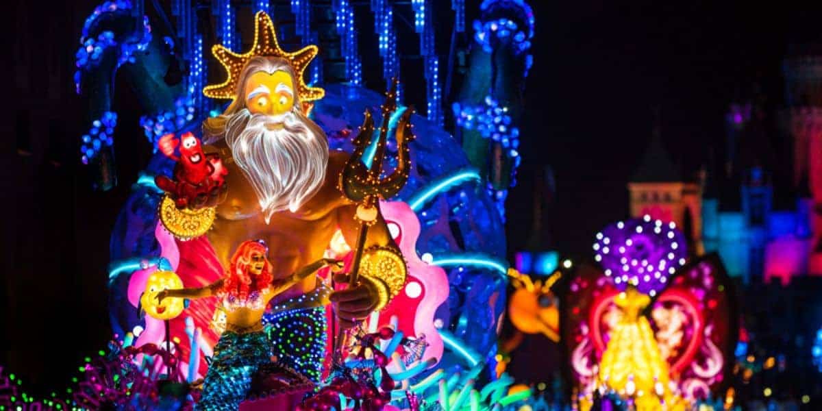 King Triton and Ariel dazzle on a glowing Paint the Night float at Disneyland, where a guest’s stunt led to a parade ban.