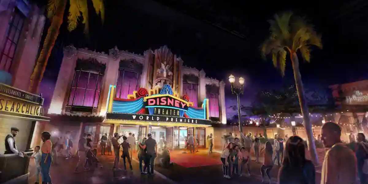 Fans fill the plaza outside Disney Theater at night, neon lights and palm trees glowing, for the debut of a new Disney retheme.