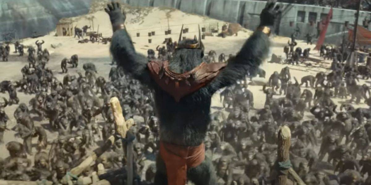 Caesar raises his arms before a gathering of apes in a walled area, recalling a scene from Planet of the Apes.