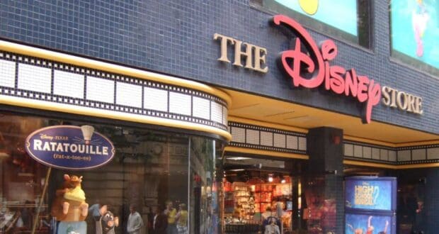 The Disney Store entrance with vibrant Ratatouille and High School Musical displays welcoming fans to a world of Disney magic.