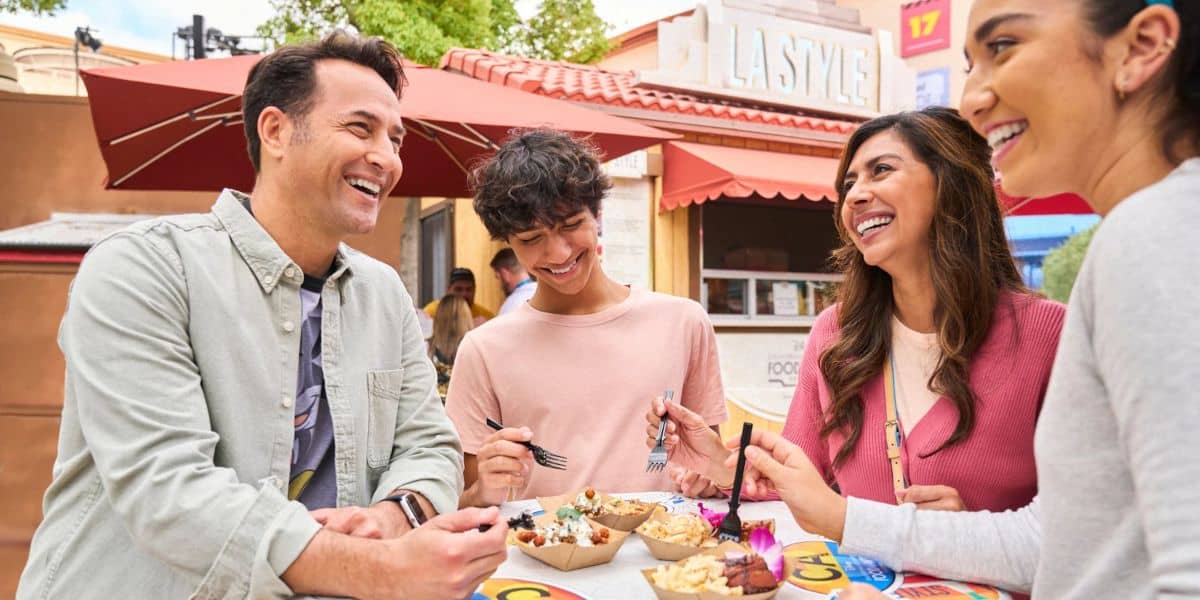 Disneyland guests eating at a table