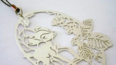 Bambi filigree metal ornament on a hanging cord, a souvenir from a Walt Disney World interactive attraction.
