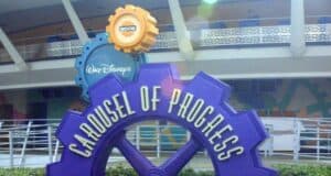 The Carousel of Progress sign at Magic Kingdom, a classic attraction featured during Disney World holiday closures.