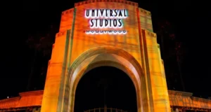 Universal Studios Hollywood entrance arch lit up for Halloween Horror Nights.
