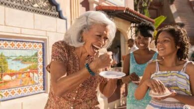 A family enjoying Global Market bites at the EPCOT International Food & Wine Festival.