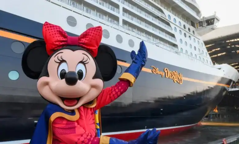 Minnie Mouse posing in front of the Disney Destiny cruise ship for vacation news.
