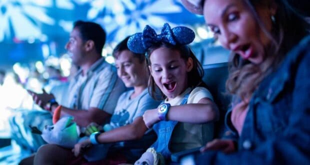 A family rope-dropping Frozen Ever After at EPCOT.
