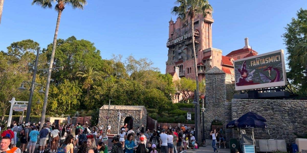 The Twilight Zone Tower of Terror and a Fantasmic! billboard at Disney World.