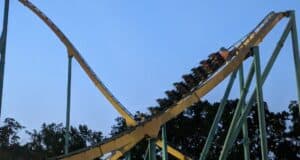 Coaster train ascending the lift hill of Goliath at Six Flags Over Georgia