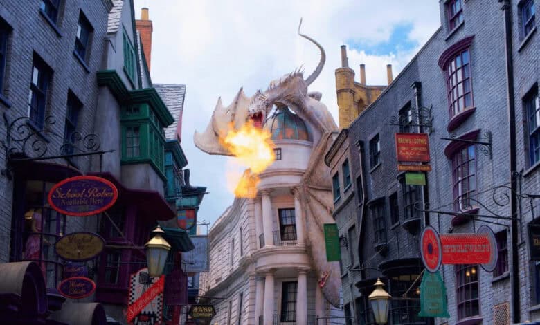 The Ukrainian Ironbelly dragon breathing fire atop Gringotts Wizarding Bank at The Wizarding World of Harry Potter.