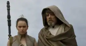 Rey and Luke Skywalker on Ahch-To in Star Wars.
