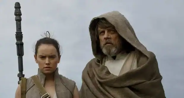 Rey and Luke Skywalker on Ahch-To in Star Wars.