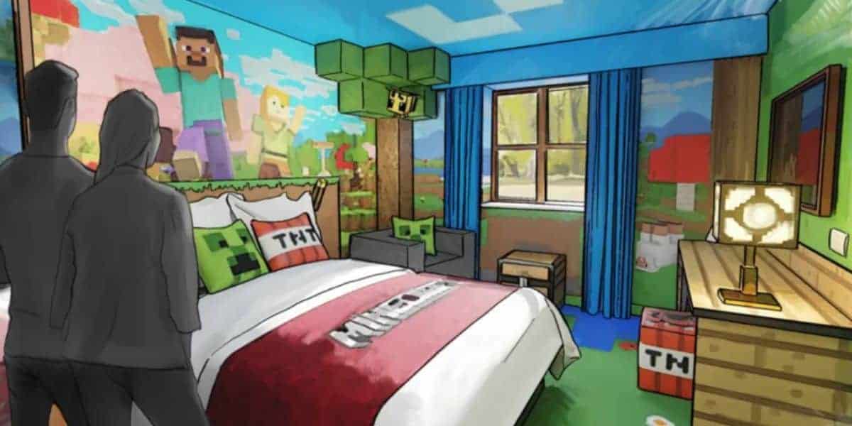 Two guests exploring a Minecraft-themed hotel room.