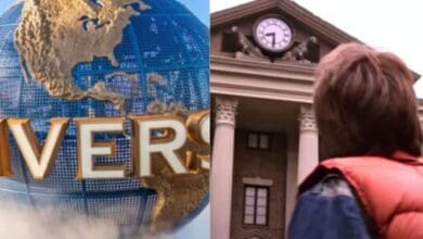 Marty McFly looking at the Hill Valley Clock Tower next to the Universal Studios globe.
