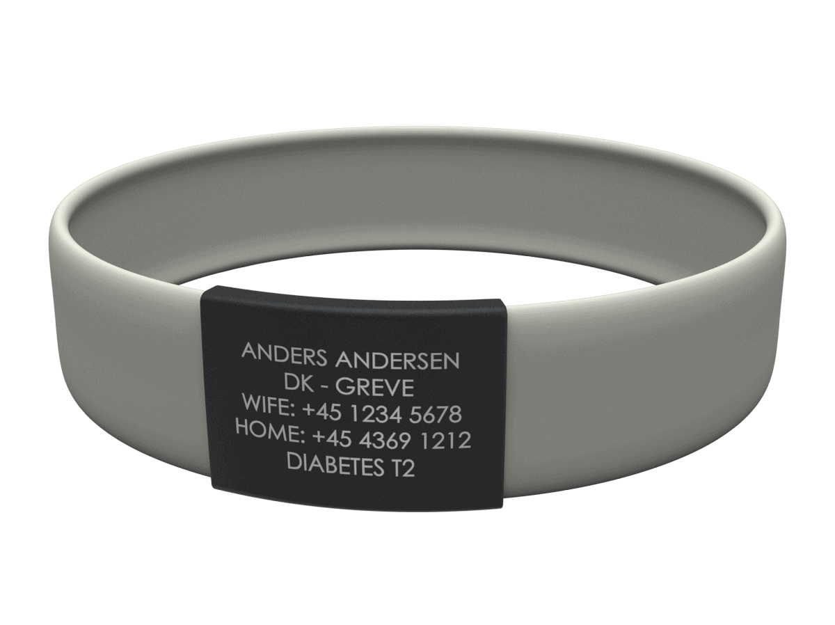 Medicinsk ID-armbånd med Anders Andersens kontakt- og diabetesoplysninger.