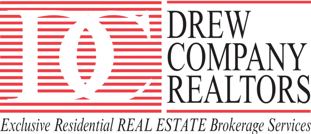 Andrew Montoya, Drew Company Realtors logo with red and black design.
