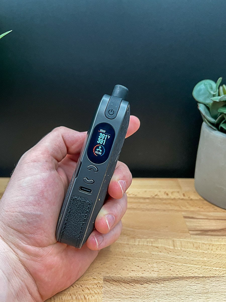 AirVape Legacy Pro 2 Review: vaporizer showing temperature display and textured grip held in hand