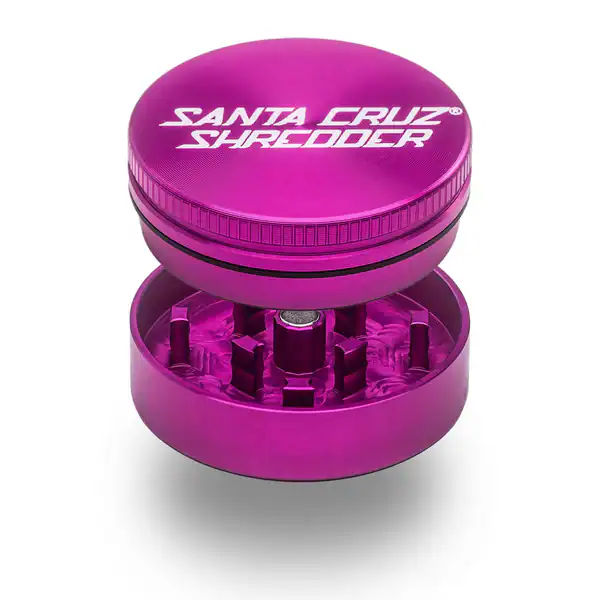Santa Cruz Shredder 2-piece herb grinder in glossy pink, open to show shredding teeth