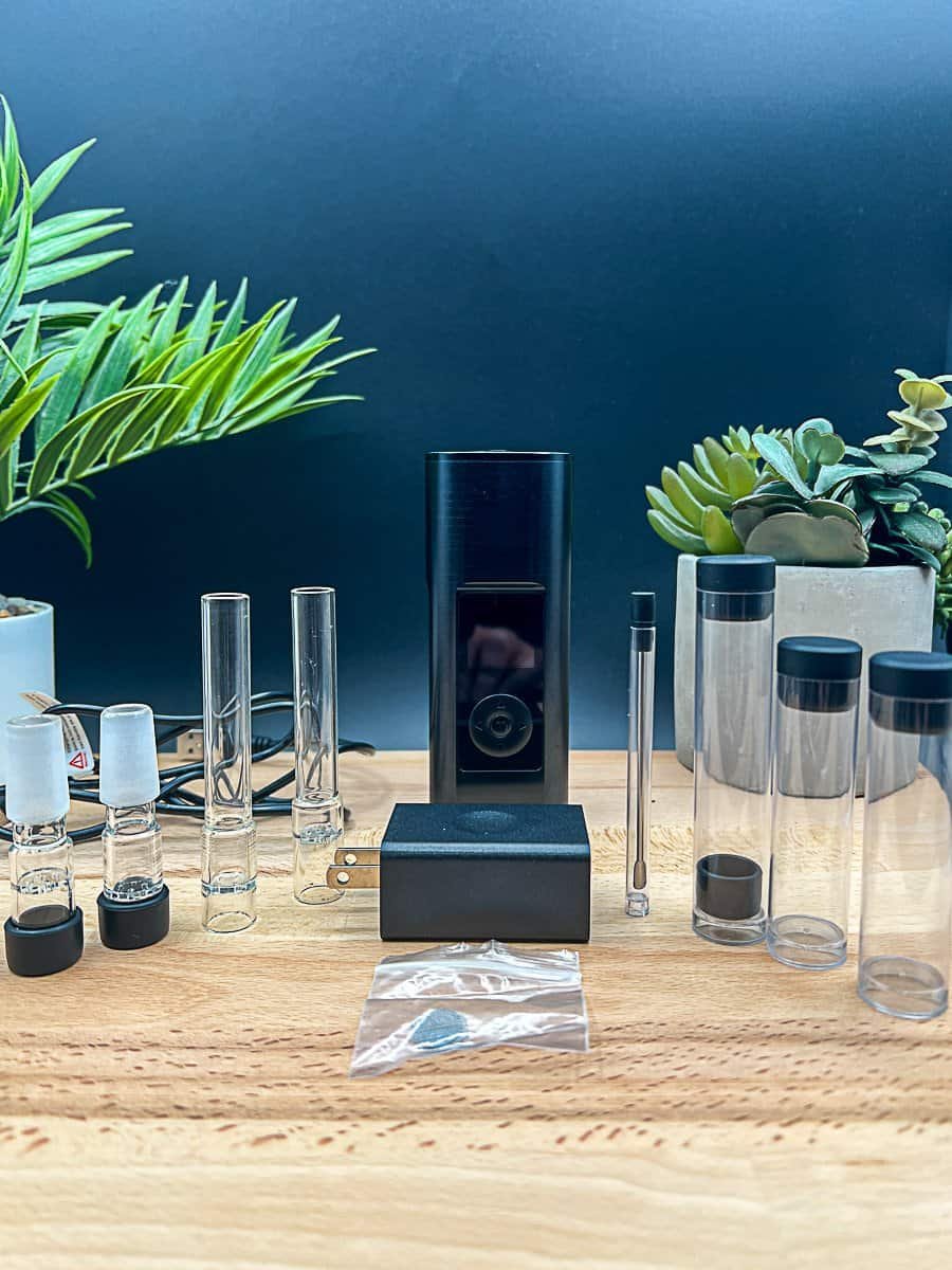 Arizer Solo 3 v2 vaporizer with all included accessories, including glass aroma tubes, water pipe adapters, and charger.