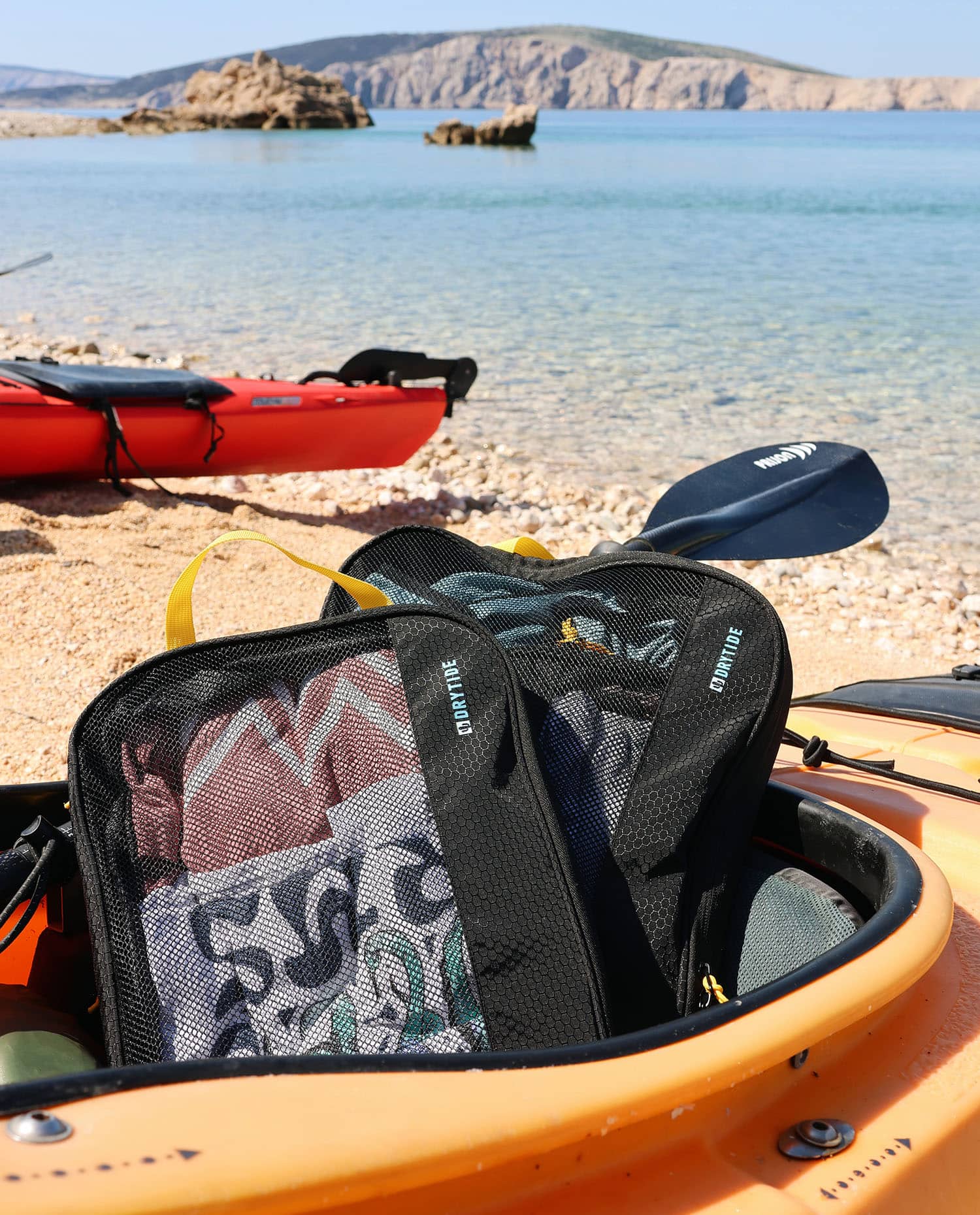 DryTide Waterproof Backpack on Beach Packing cubes and sea kayaking trip