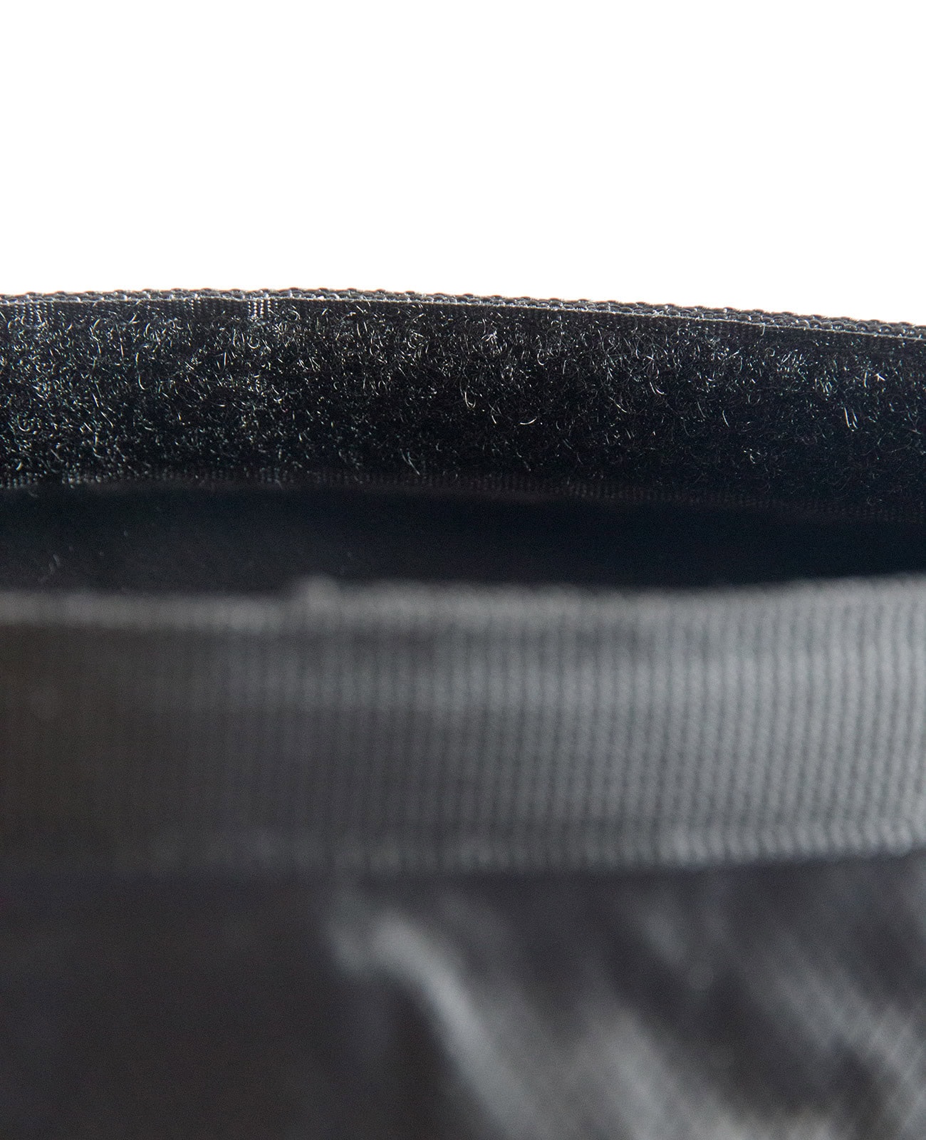 Waterproof Waist Bag 2.0 - Close-up of durable material and secure zipper for outdoor adventures velcro closeup on the roll down top of the DryTide waterproof waist bag