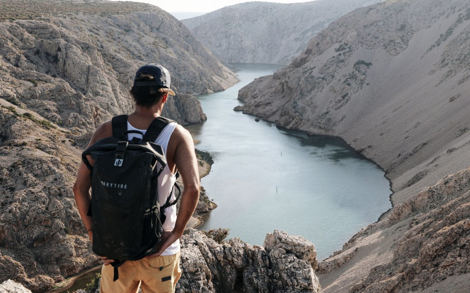 Looking at the Zrmanja canyon from above with DryTide 30L backpack on the shoulders