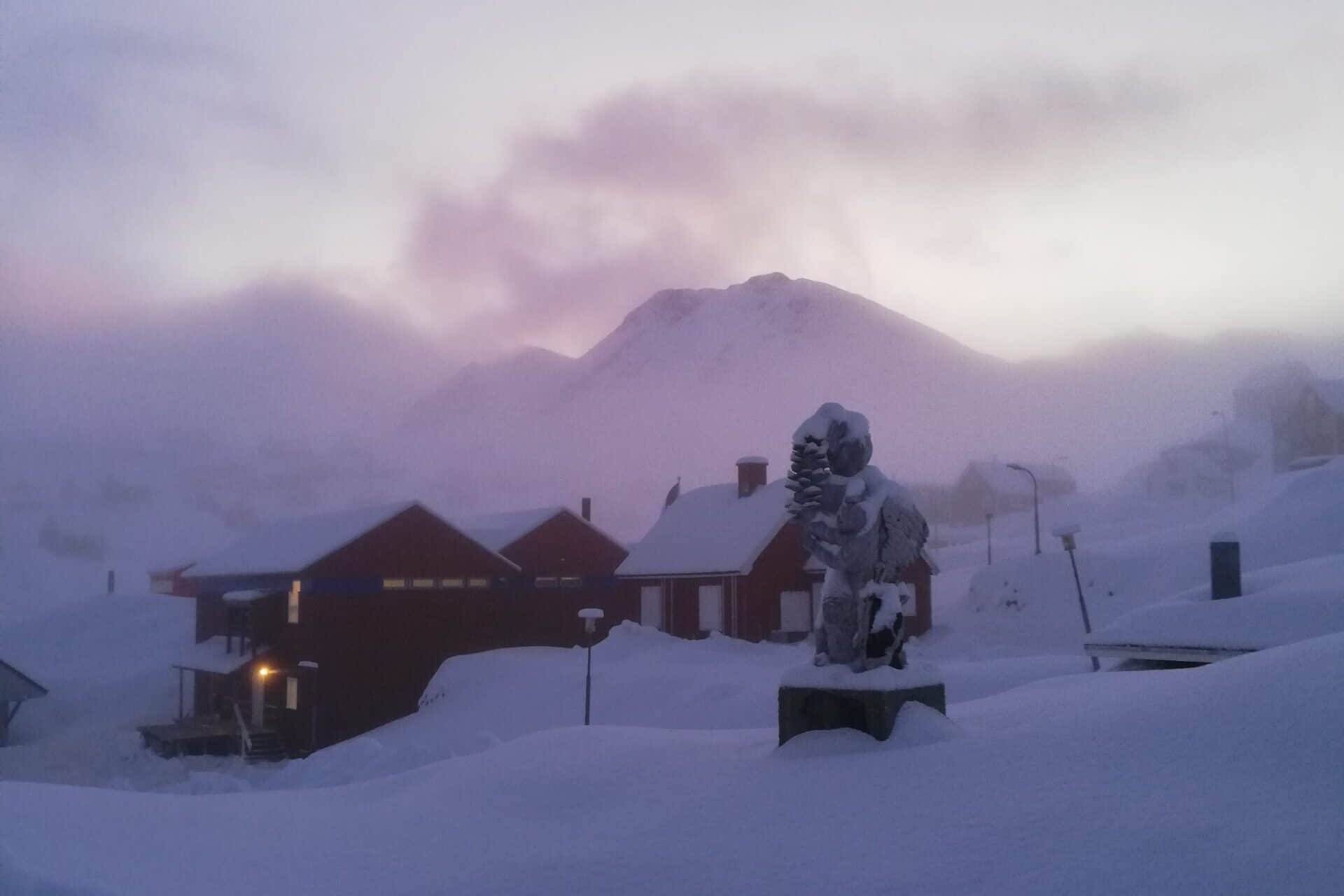 Piteraq storm approaching in Tasiilaq during winter.