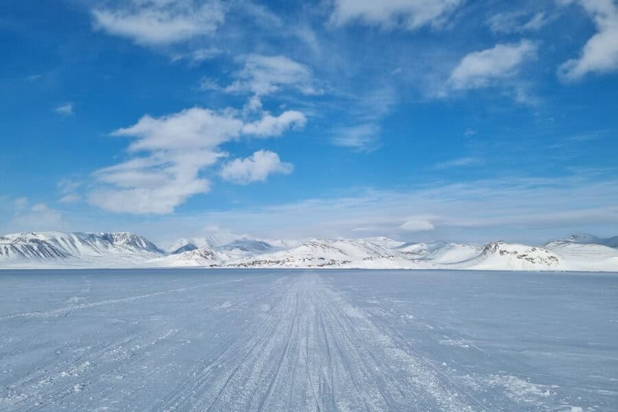 Ittoqqortoormiit from a distance during winter. Photo by Charlotte Pike