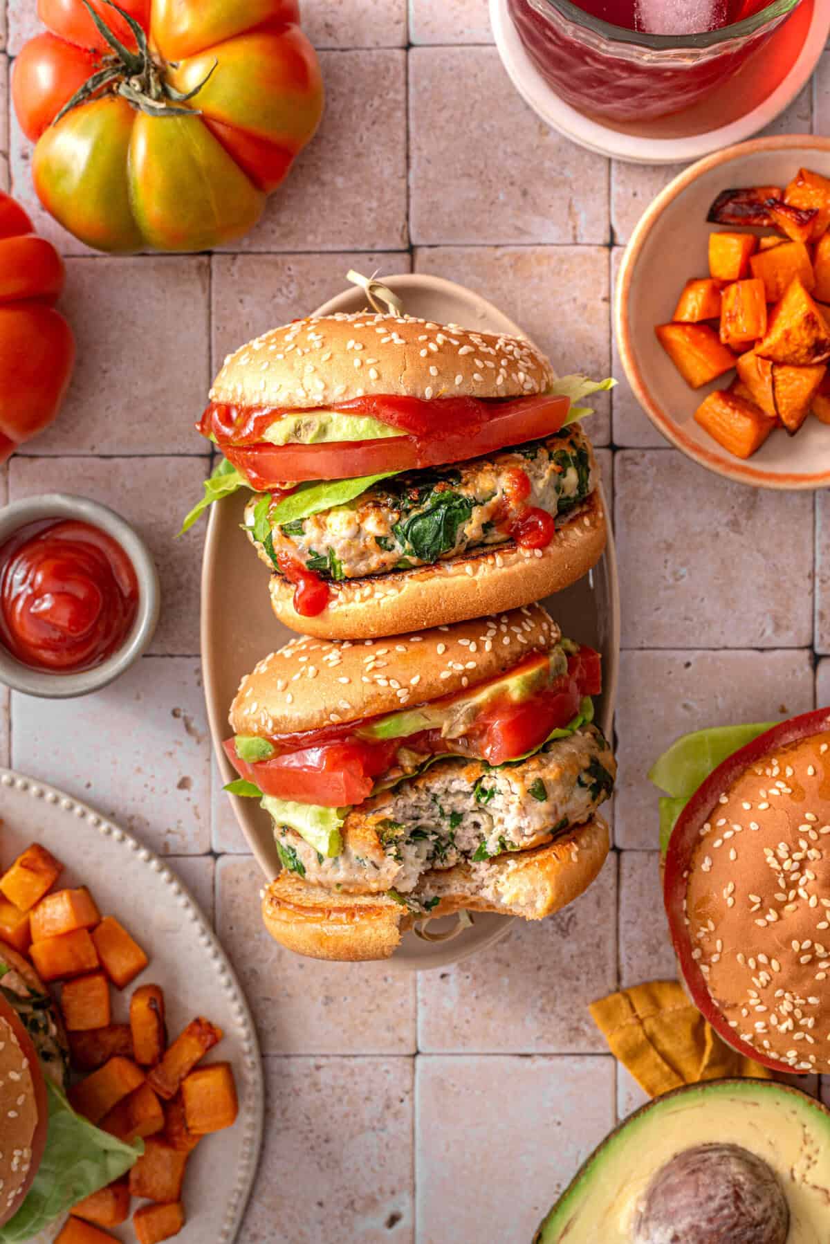 this is a top view of my healthy chicken feta spinach burgers in a boat. 