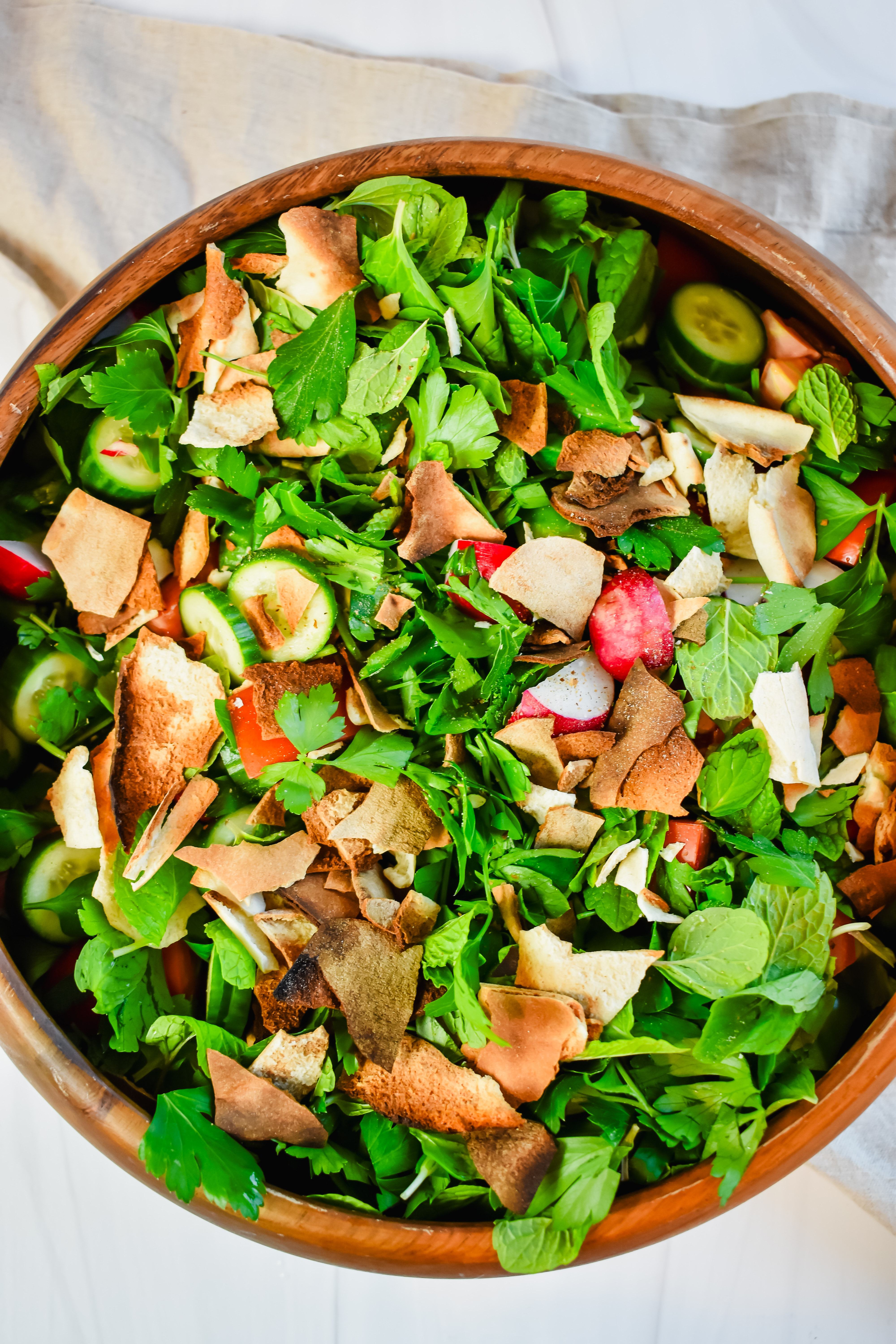 This is a top view of my fattoush salad in the salad bowl before it was mixed. 