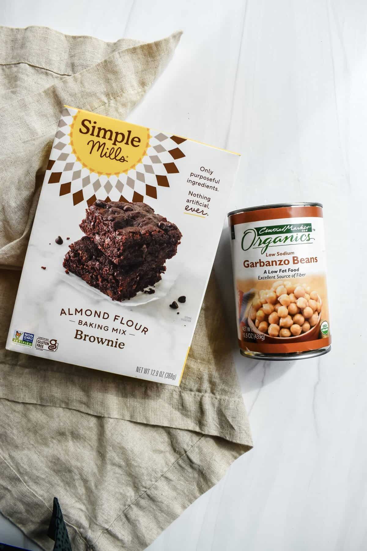this shows the two ingredients. the chickpeas and the box of brownies mix.