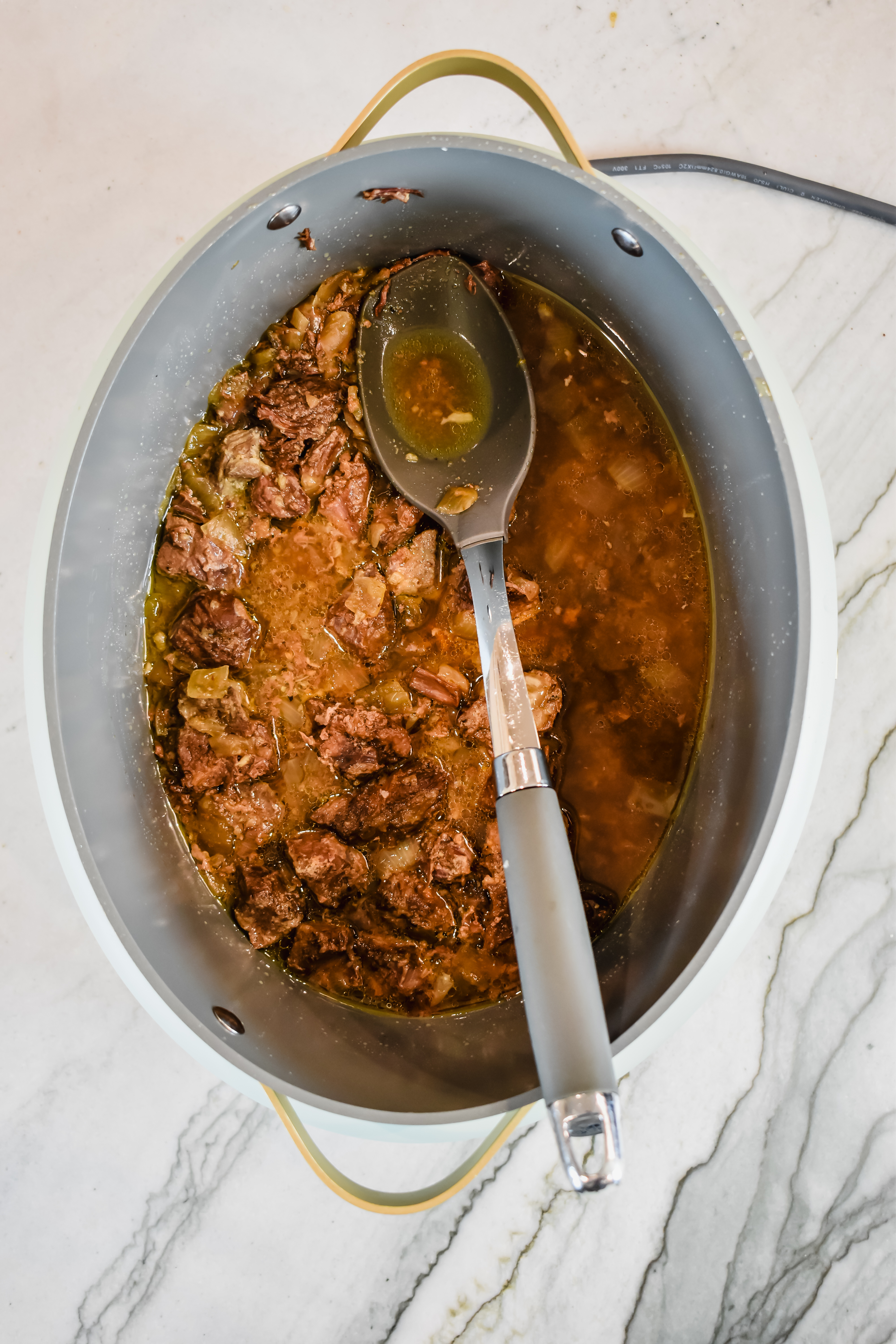 this is a top view of my garlic butter steak bite in the slow cooker 