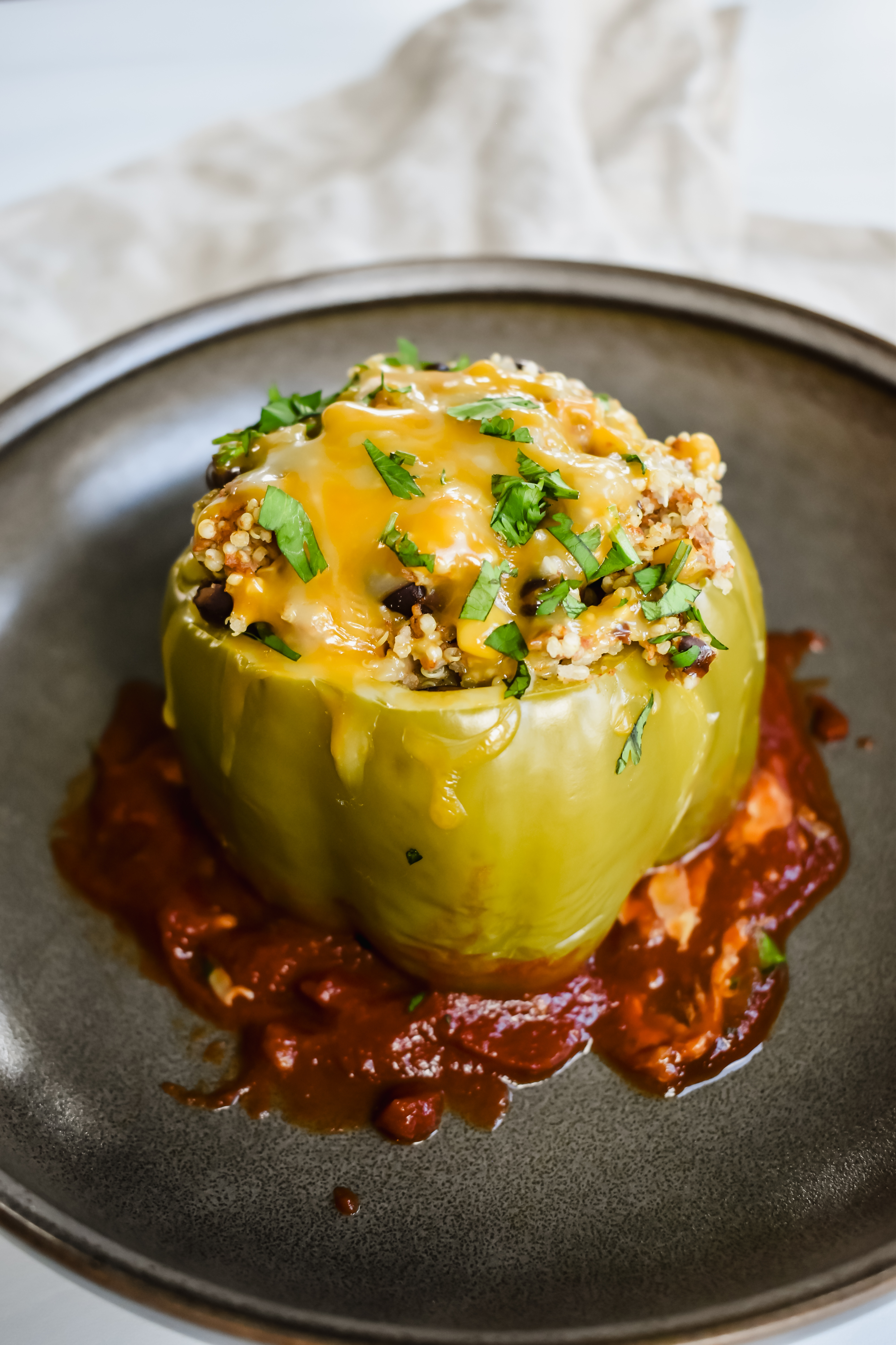 this shows the individual stuffed pepper on the plate before adding my additional toppings. 