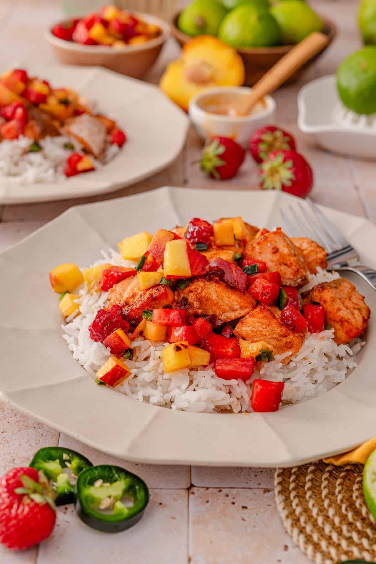 this is a side view close up of my air-fryer salmon with strawberry salsa in a bowl 